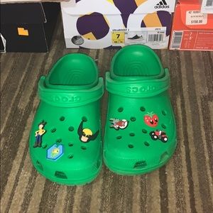 Green Crocs (Jibbitz included)
